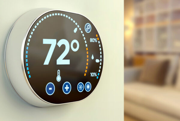 Smart thermostat controlling temperature in a modern home in Ghana.